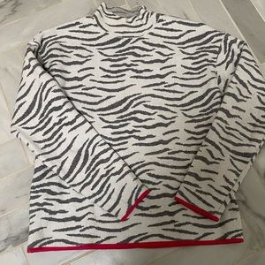 Super soft Anthropologie mock neck sweater. Animal print
